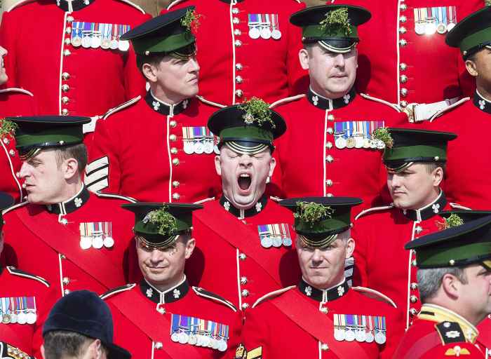 A soldier is caught yawning.