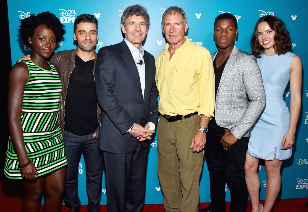 Lupita Nyong'o, Oscar Isaac, Harrison Ford, John Boyega and Daisy Ridley posed with Walt Disney Studios Chairman Alan Horn at an August 2015 event.