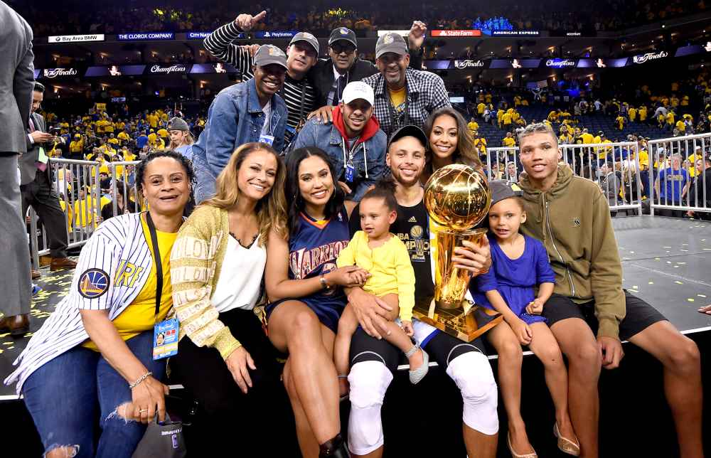Stephen Curry #30 of the Golden State Warriors with family and friends celebrates winning the NBA Championship in Game Five against the Cleveland Cavaliers of the 2017 NBA Finals on June 12, 2017 at Oracle Arena in Oakland, California.