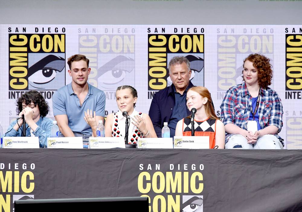 Finn Wolfhard, Dacre Montgomery, Millie Bobby Brown, Paul Reiser, Sadie Sink and Shannon Purser attend Netflix's "Stranger Things" panel during Comic-Con International 2017 at San Diego Convention Center on July 22, 2017 in San Diego, California.