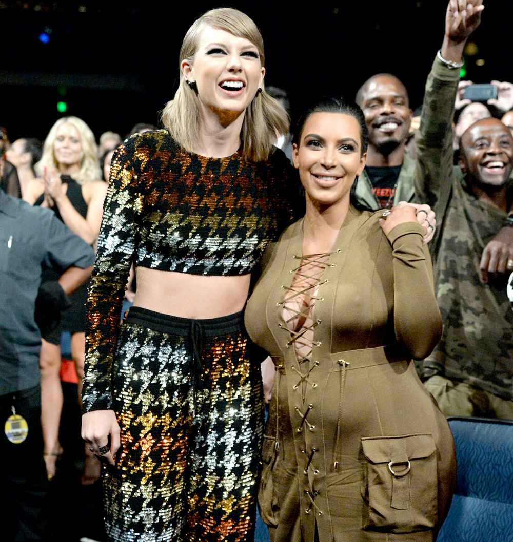 Taylor Swift and Kim Kardashian West attend the 2015 MTV Video Music Awards.