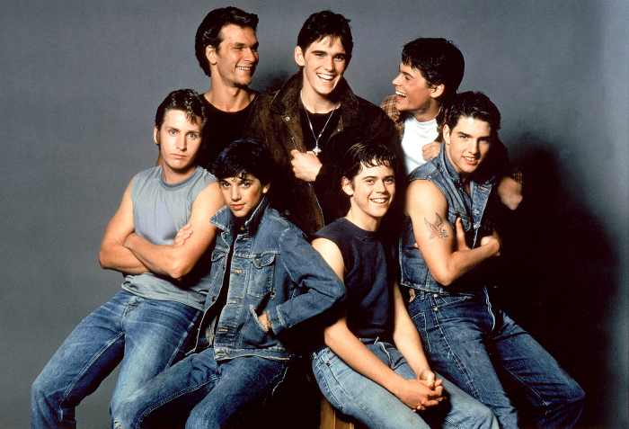 Patrick Swayze, Matt Dillon, Rob Lowe, Emilio Estevez, Ralph Macchio, Thomas C. Howell, and Tom Cruise on the set of The Outsiders.