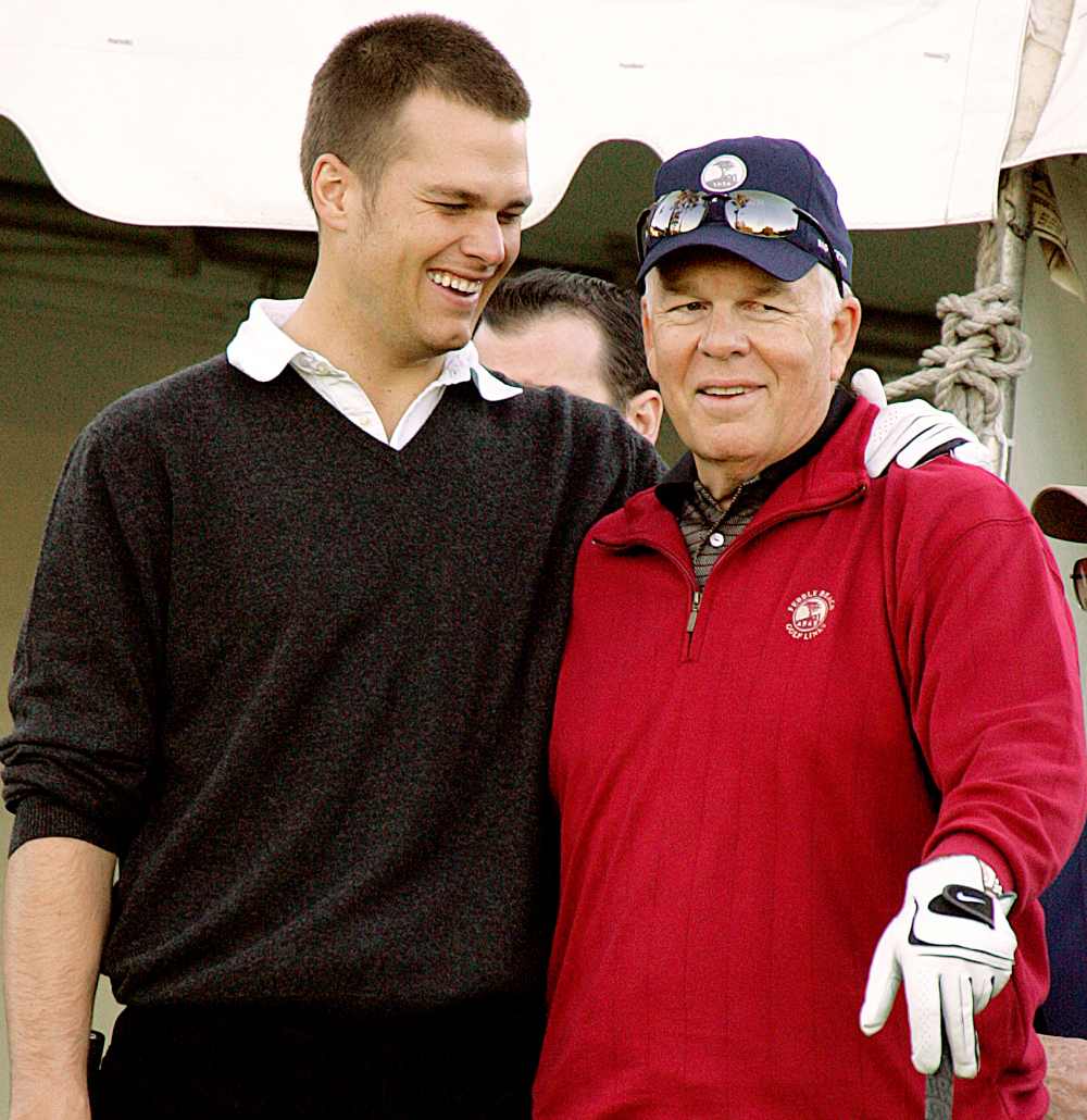 Tom Brady, left, hugs his father Tom Brady Sr. on the first hole of the Poppy Hills course during the first round of the AT&T Pebble Beach National Pro-Am golf tournament Thursday, Feb. 9, 2006, in Pebble Beach, Calif.