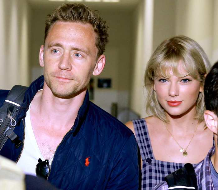Tom Hiddleston and Taylor Swift arrive at Sydney International Airport in Sydney, New South Wales.