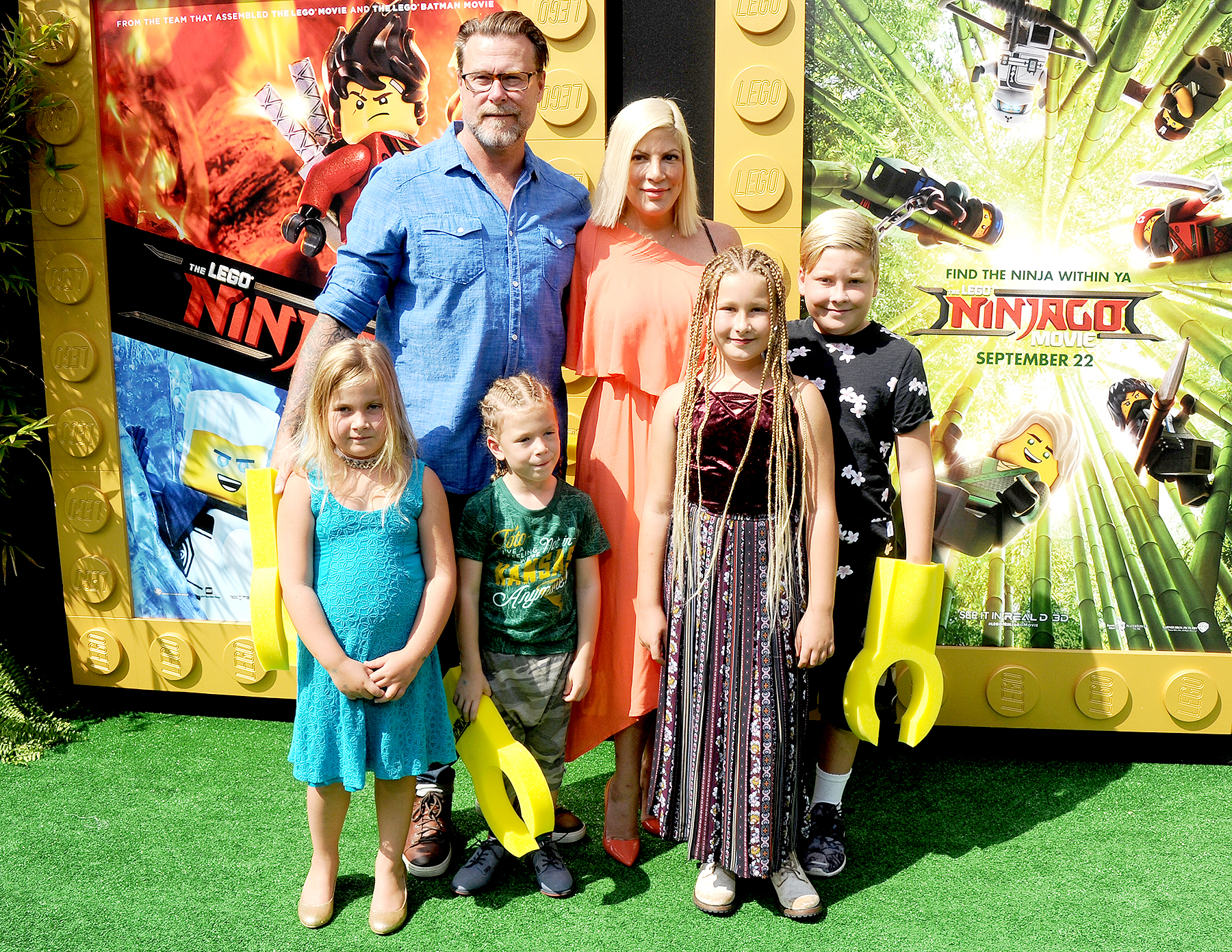 Tori Spelling, Dean McDermott and children arrive at the premiere of Warner Bros. Pictures' "The LEGO Ninjago Movie" at Regency Village Theatre on September 16, 2017 in Westwood, California.