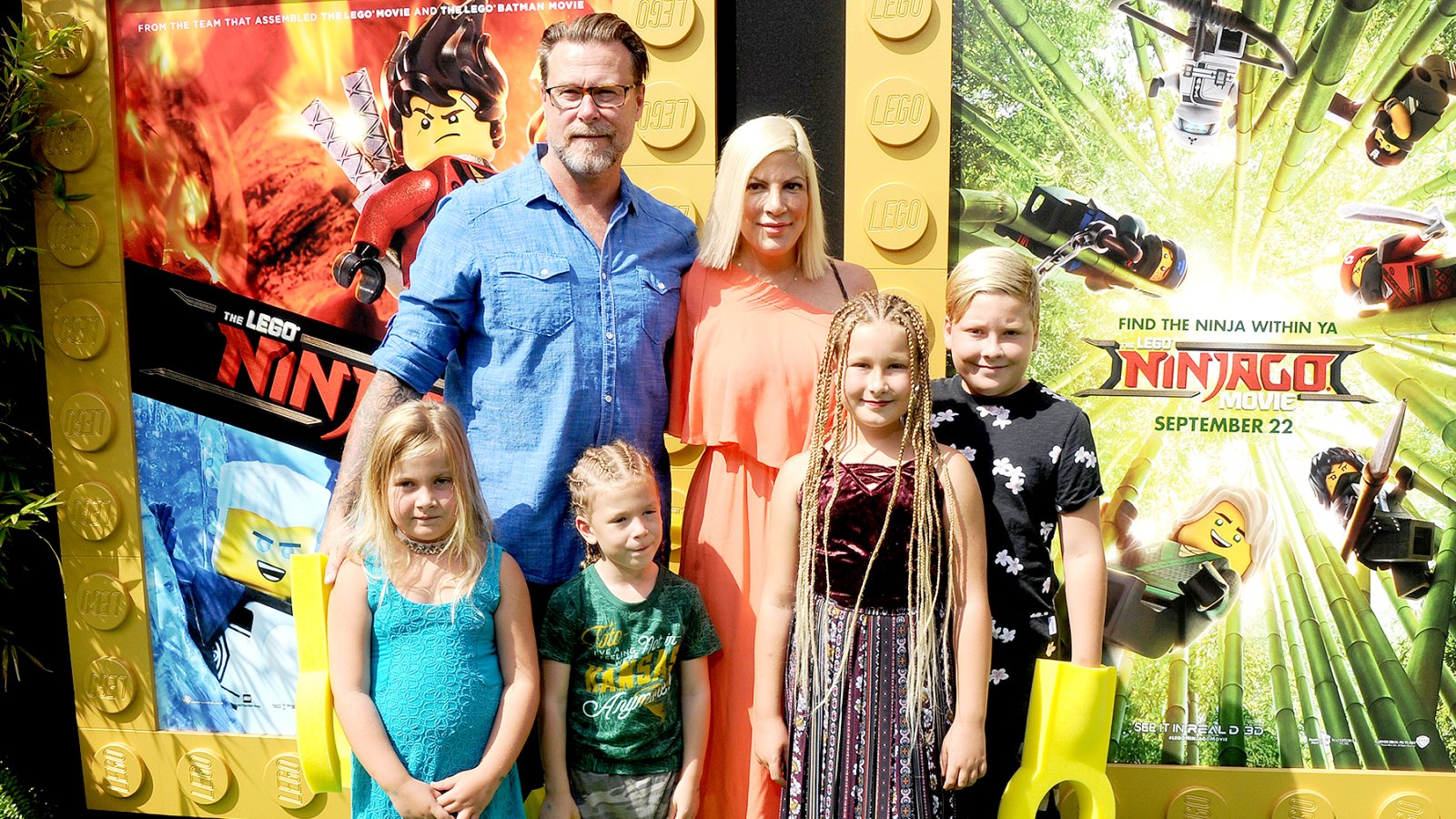Tori Spelling, Dean McDermott and children arrive at the premiere of Warner Bros. Pictures' "The LEGO Ninjago Movie" at Regency Village Theatre on September 16, 2017 in Westwood, California.