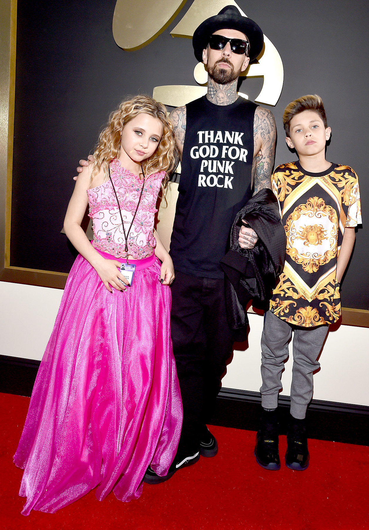 Alabama Barker, musician Travis Barker and Landon Barker attend The 58th GRAMMY Awards.