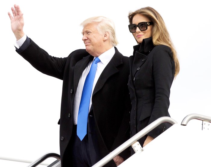 U.S. President-elect Donald Trump and his wife Melania arrive at Joint Base Andrews outside Washington, D.C., U.S., on Thursday, Jan. 19, 2017.