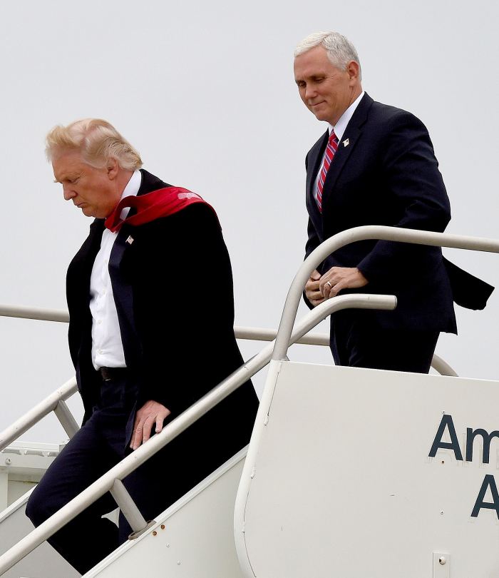 Donald Trump and Mike Pence arrive on Dec. 1, 2016, at the airport before they visit the Carrier air-conditioning and heating company in Indianapolis.