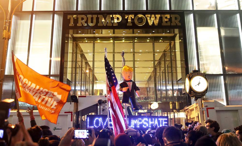 Hundreds of protestors rallying against Donald Trump gather outside of Trump Tower, November 9, 2016 in New York City.