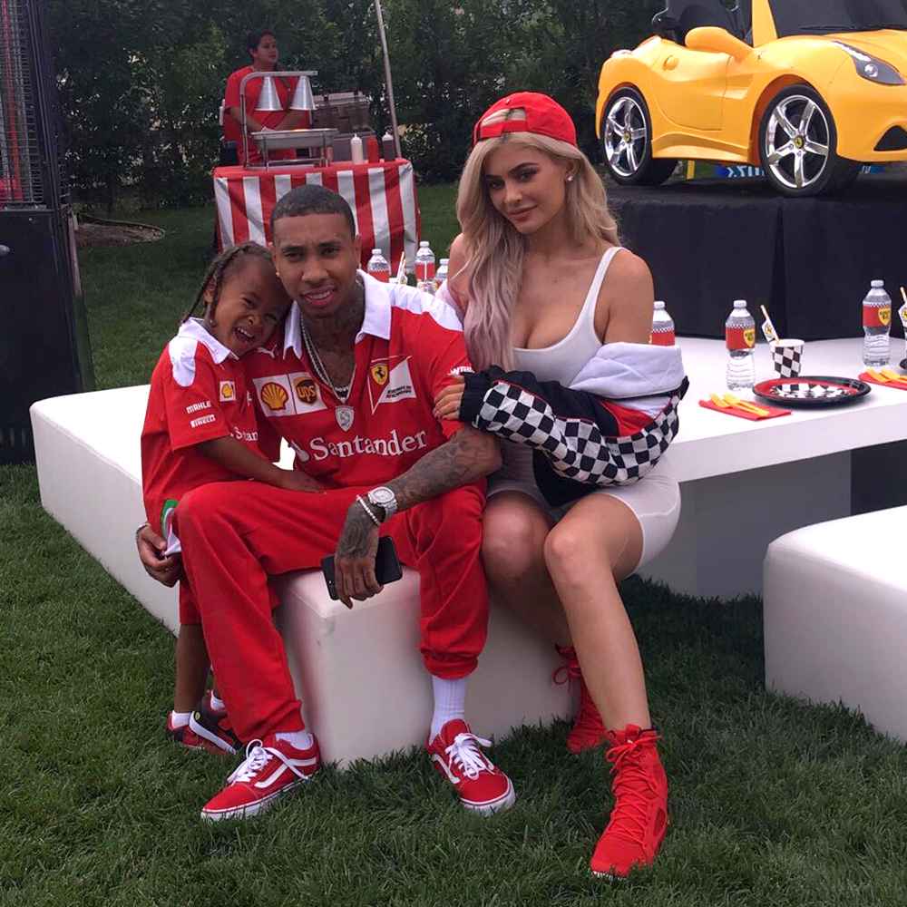Tyga and Kylie Jenner with King at his birthday party on Sunday, October 16.