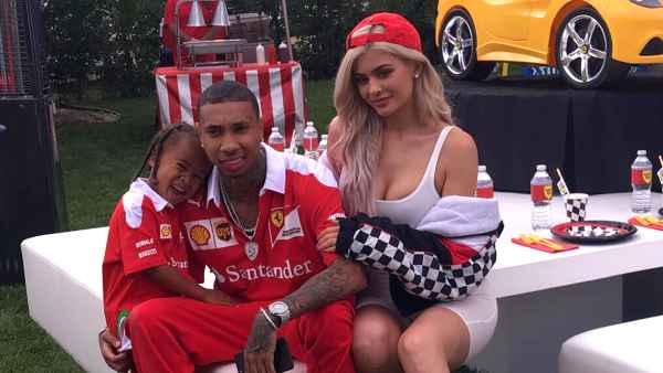 Tyga and Kylie Jenner with King at his birthday party on Sunday, October 16.