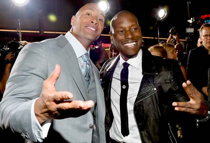 Dwayne 'The Rock' Johnson and Tyrese Gibson attend Universal Pictures' "Furious 7" premiere at TCL Chinese Theatre on April 1, 2015 in Hollywood, California.