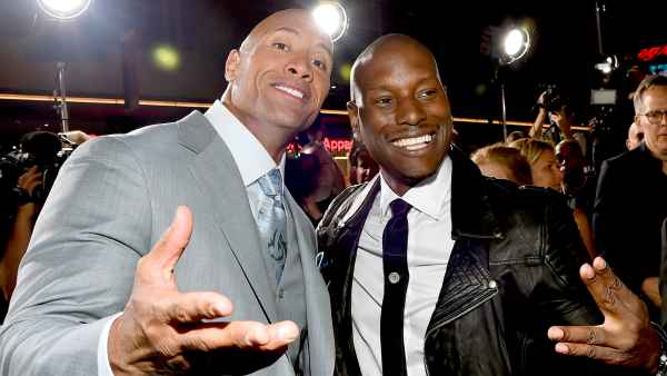 Dwayne 'The Rock' Johnson and Tyrese Gibson attend Universal Pictures' "Furious 7" premiere at TCL Chinese Theatre on April 1, 2015 in Hollywood, California.