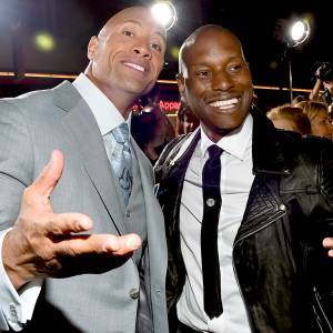 Dwayne 'The Rock' Johnson and Tyrese Gibson attend Universal Pictures' "Furious 7" premiere at TCL Chinese Theatre on April 1, 2015 in Hollywood, California.