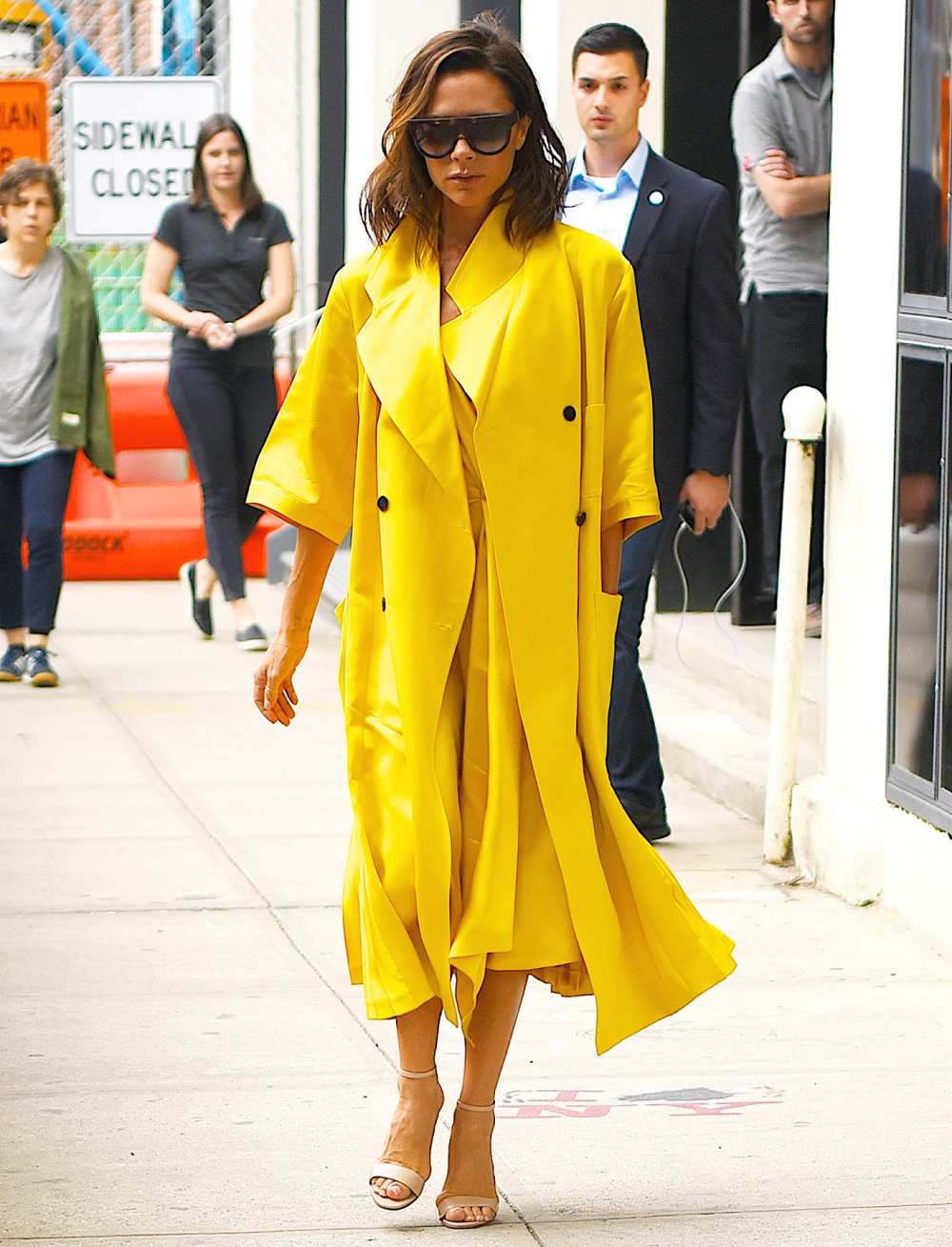 Victoria Beckham yellow coat