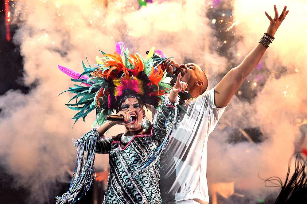 Liliana Saumet of Bomba Estereo and Will Smith perform onstage during the 16th Latin GRAMMY Awards at the MGM Grand Garden Arena on November 19, 2015 in Las Vegas, Nevada.