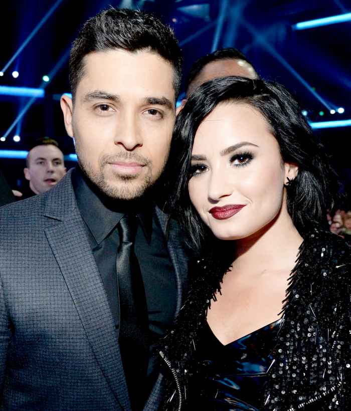 Wilmer Valderrama and Demi Lovato attend the 2015 American Music Awards.