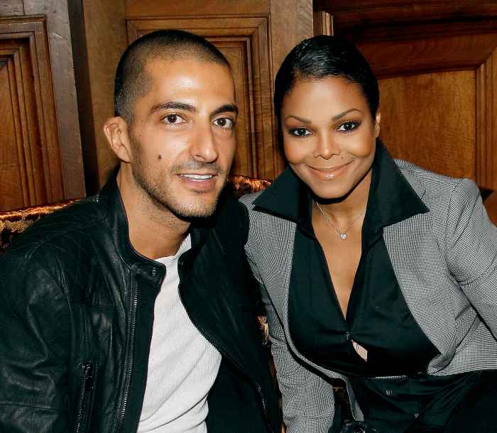 Wissam Al Mana and Janet Jackson attend the John Galliano Ready to Wear Spring/Summer 2011 show during Paris Fashion Week at Opera Comique on October 3, 2010 in Paris, France.