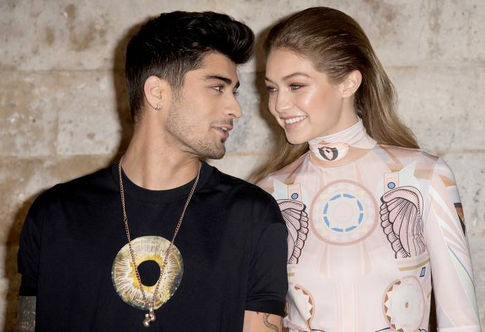 Zayn Malik and Gigi Hadid attend the Givenchy show as part of the Paris Fashion Week Womenswear Spring/Summer 2017 on October 2, 2016 in Paris, France.